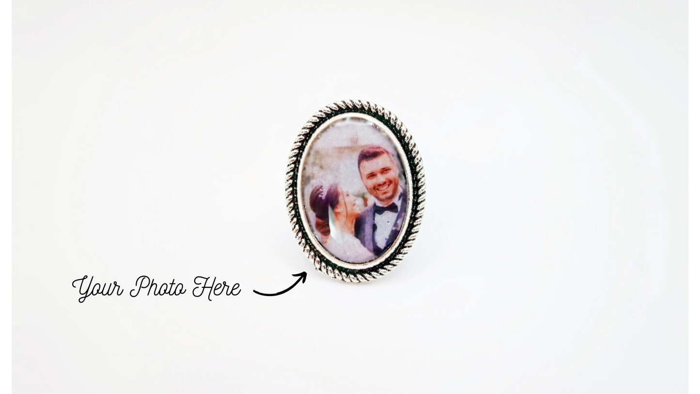 Large custom photo oval ring with decorative edge sealed in clear acrylic